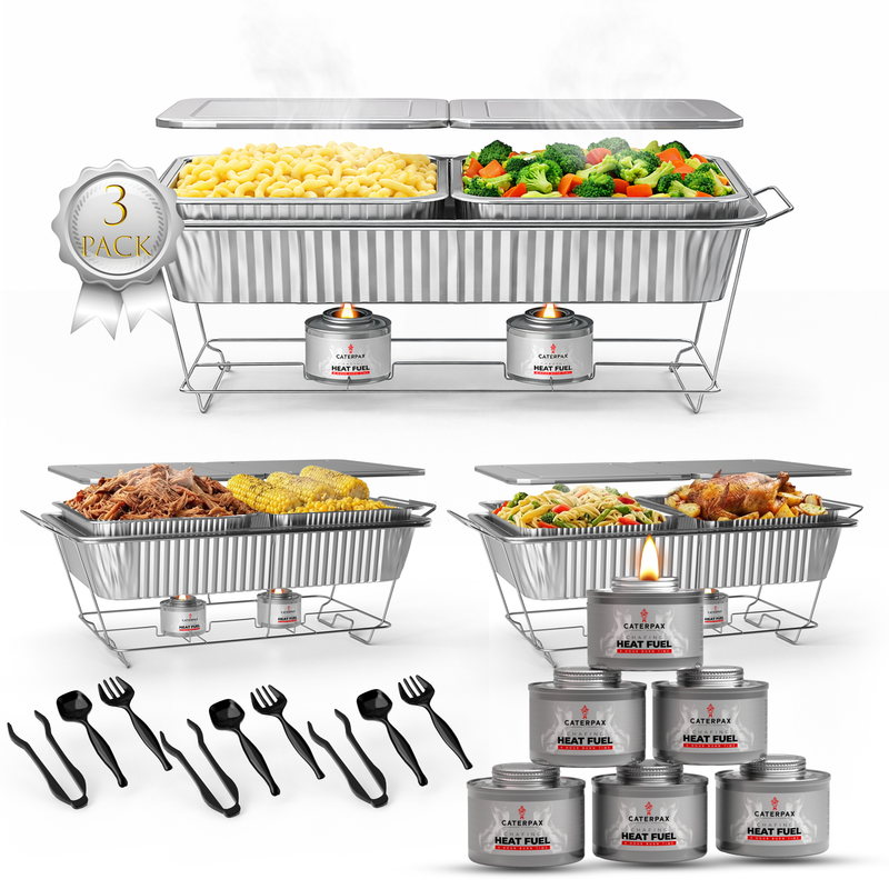 Three-pack of metal food warmers with candles and utensils on a white background